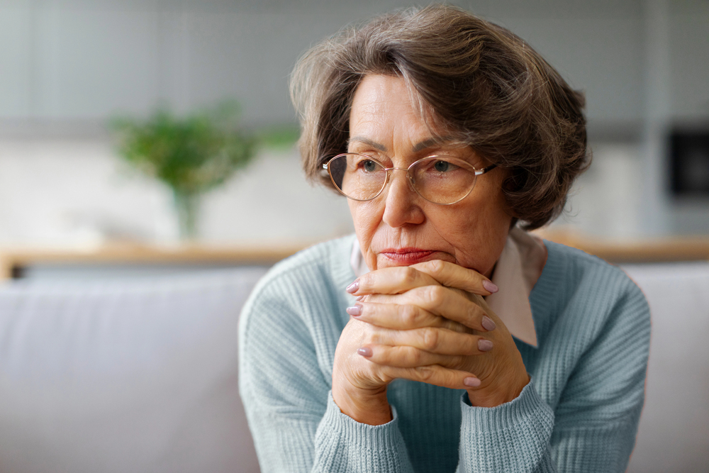 Older adult thinking about quiet tradeoffs to stay independent